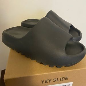 Selling my Yeezy Slide. Just got them for Christmas and they are to small.